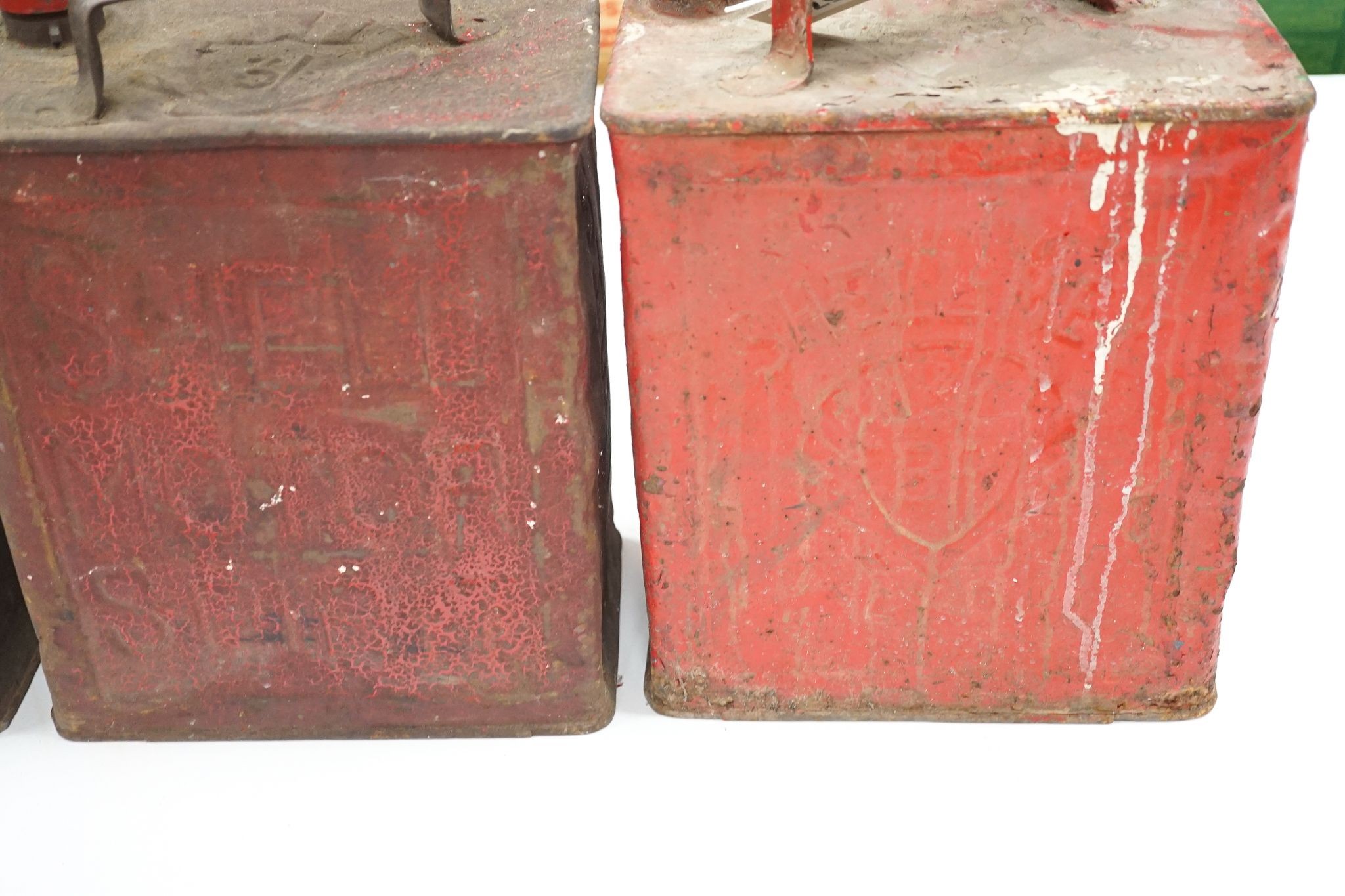 Three various petrol cans